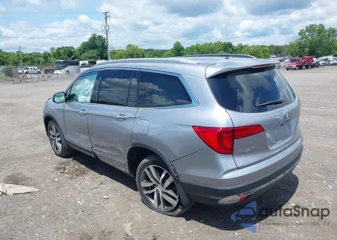 2017 Honda Pilot Touring z USA, uszkodzony, nr VIN 5FNYF6H98HB025426